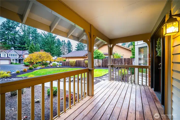 A welcoming front porch greets you and beckons you inside.