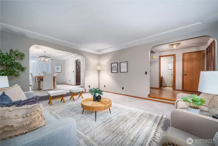 Another view showcasing the inviting entryway and formal dining room.