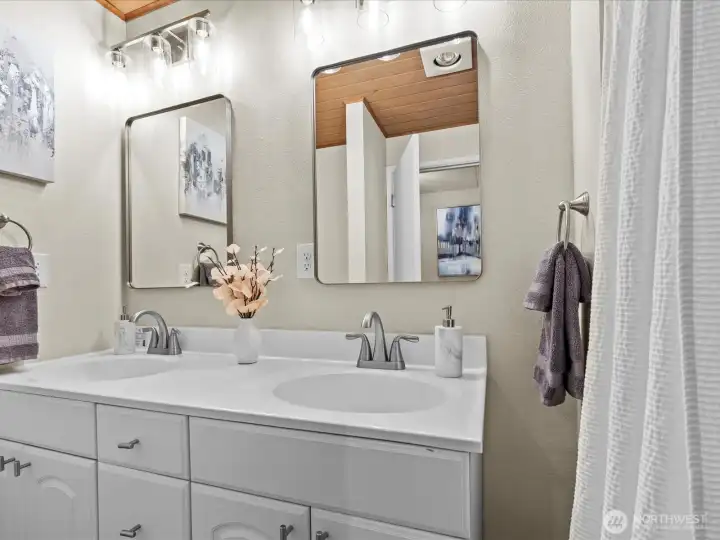Here is a Second Updated Full Bathroom on the Upper Level by the Two Spacious Bedrooms.