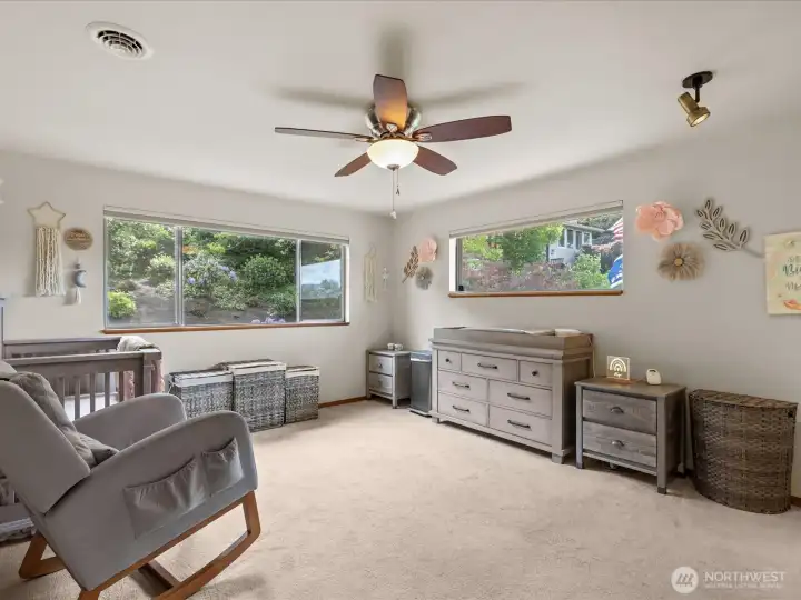 Room 2 The Views from this Room are of the Luscious Landscaping on the Eastside of the Home.  This Property Extends to the Fence.