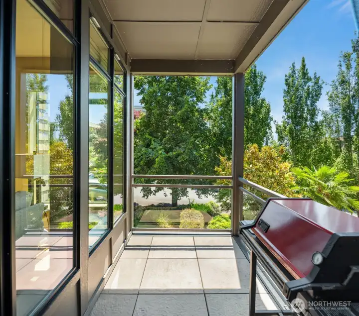 Balcony off the main living area, just adjacent to the dining room and kitchen.