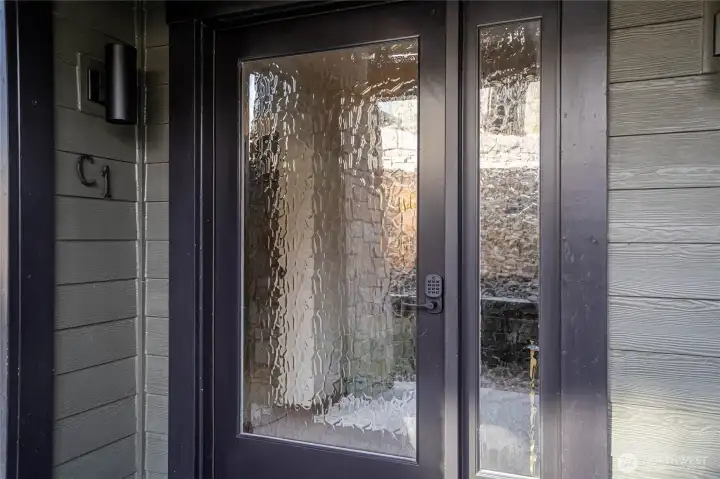 Frosted clearlight glass front door for privacy and light.
