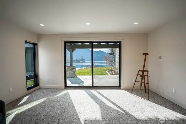 This light-filled second bedroom also features a glorious view of Lake Chelan, just steps away from the back patio.