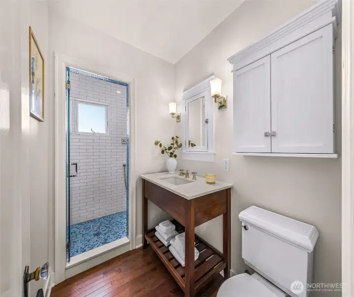 Main floor bath with beautiful tiled shower.