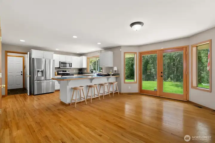 Breakfast Area with doubles doors to back porch and spacious yard.