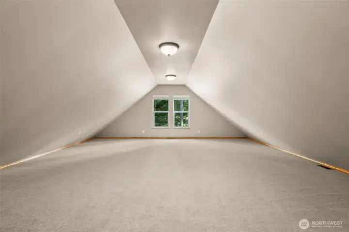 Large Bonus Room on second floor. Looks out at Driveway.