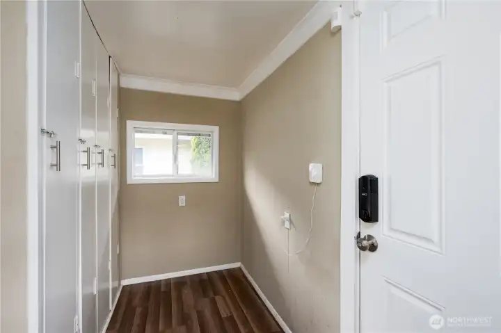 Walk in pantry and back door leading to backyard.