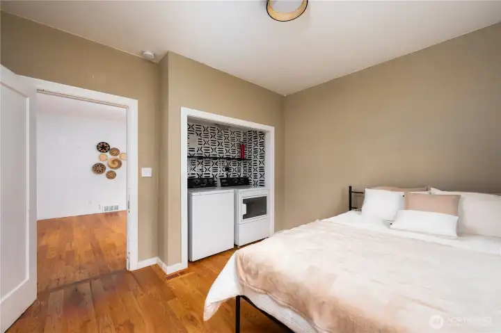 Guest bedroom on main level with washer and dryer that can moved to the basement.
