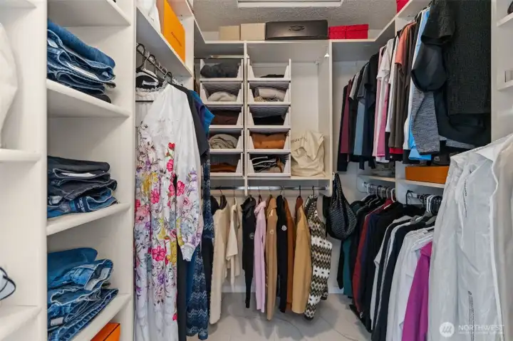 Walk-in closet with custom storage solutions