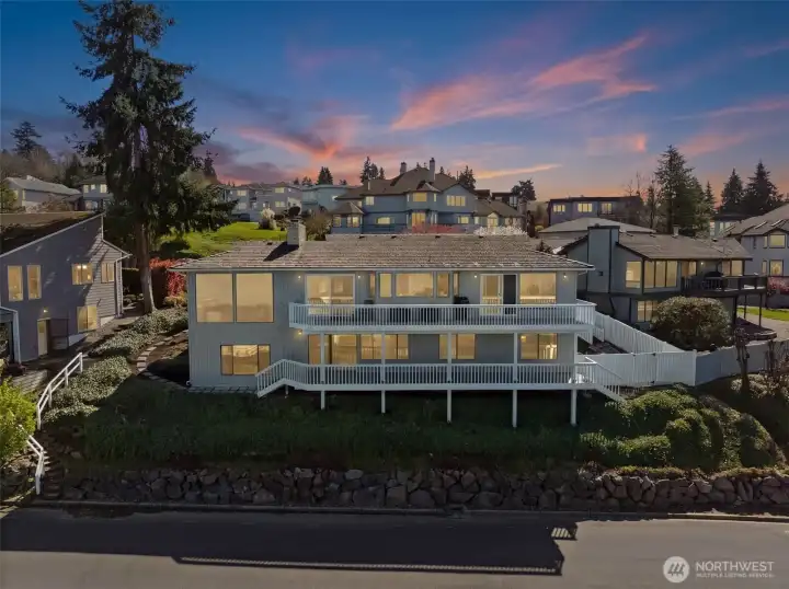 Twilight views from the water side of the house