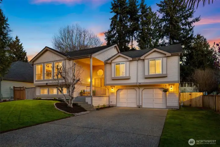 Wide, accommodating driveway with a full-size 2-car garage