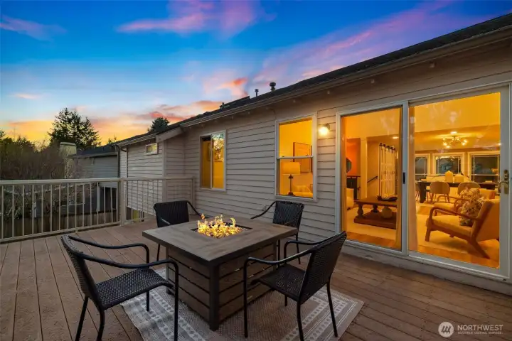 Look at the expansive, entertainment-sized deck off the living room