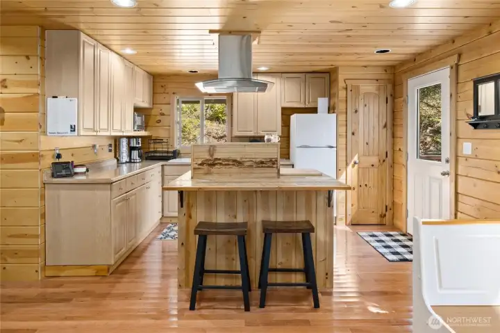 The island offers space for extra dining.