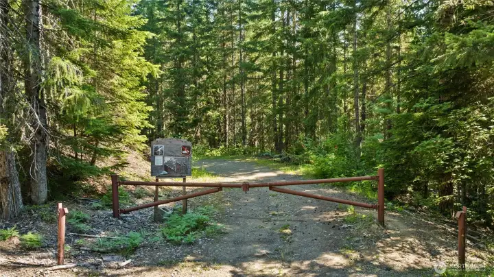 Entrance to the trail to the lake and to the famous Roaring Creek waterfall. Different parts of the community have gates for your protection and privacy