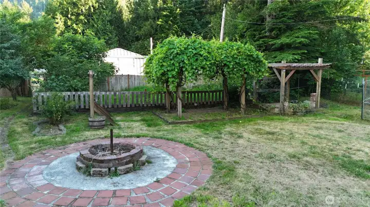Fire pit plus 2 separate wood pergolas