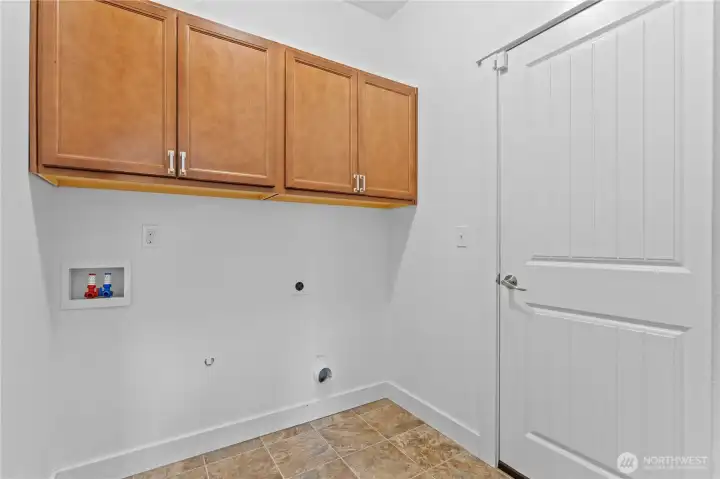 utility room that leads to garage