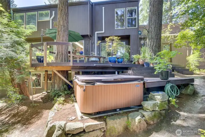 Multi level deck off family room. Enjoy the tranquil gardens and hot tub.