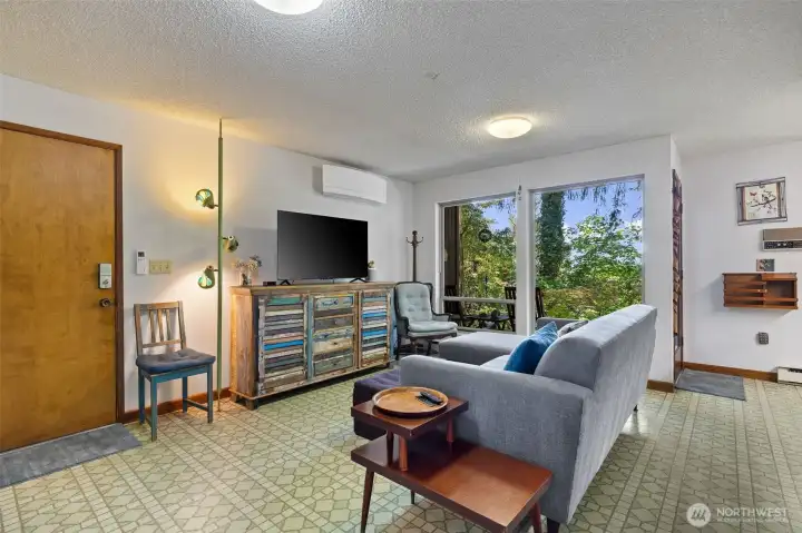 Family room off Kitchen, door to garage only one small step up to family.