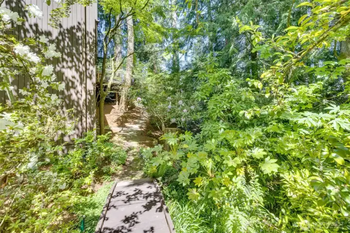 Backyard path to Separate entrance to ADU, the main house stairway is from living room.