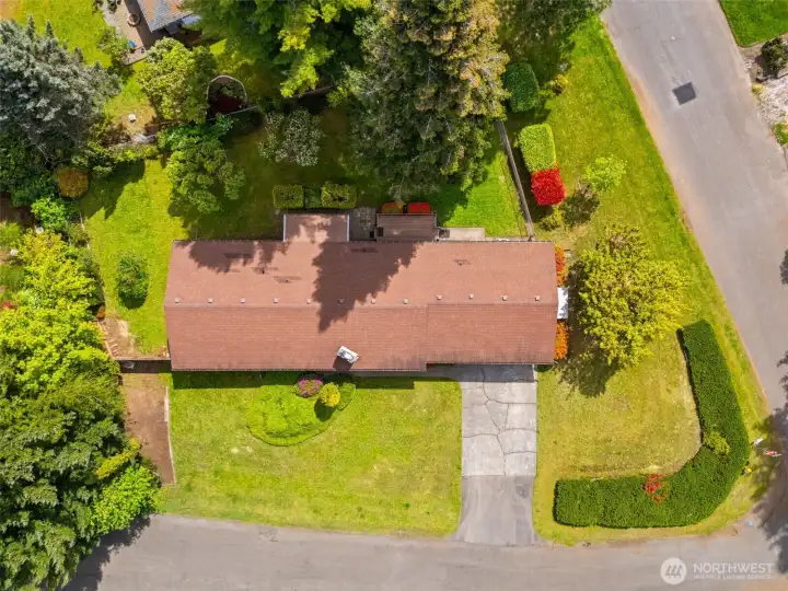 Aerial View...showing the entire lot, rear covered and uncovered decks and fenced back and side yard areas.