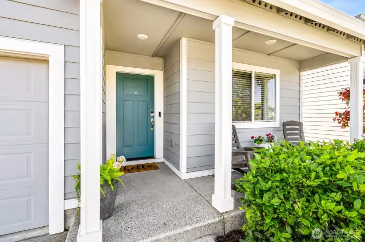 Covered entry with sitting area. Covered entry with sitting area.