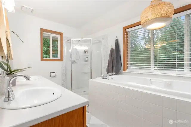 En suite full bath with separate tub/shower.