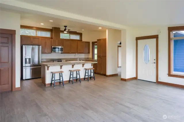 Entry, kitchen with granite tile island, all new appliances