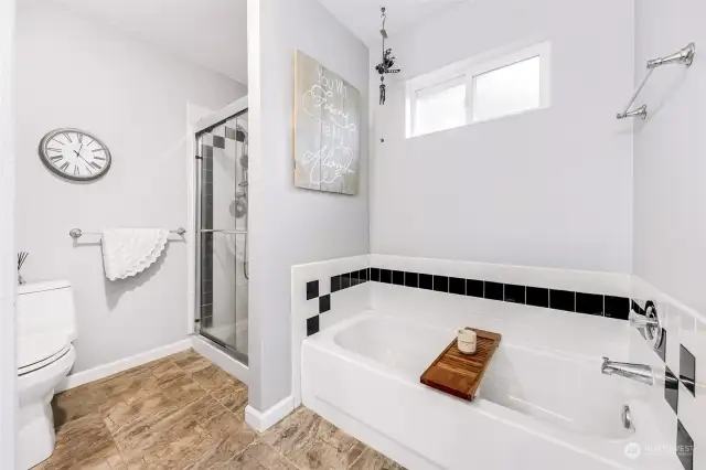 Spacious soaking tub and walk-in shower.