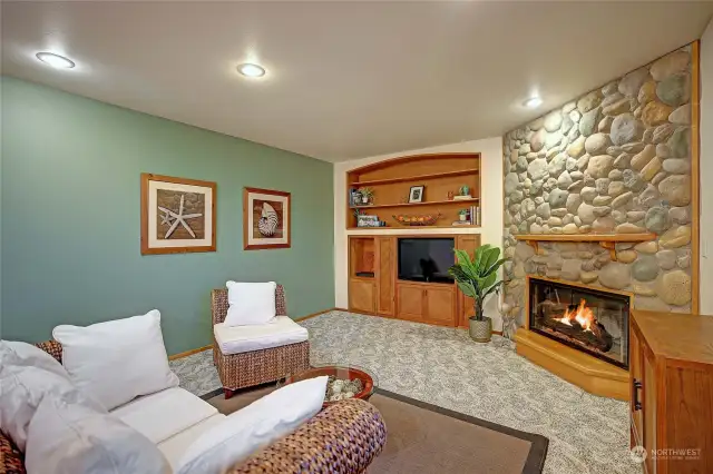 Family with wood burning fireplace..