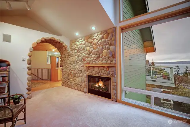 Living room with wood burning fireplace..