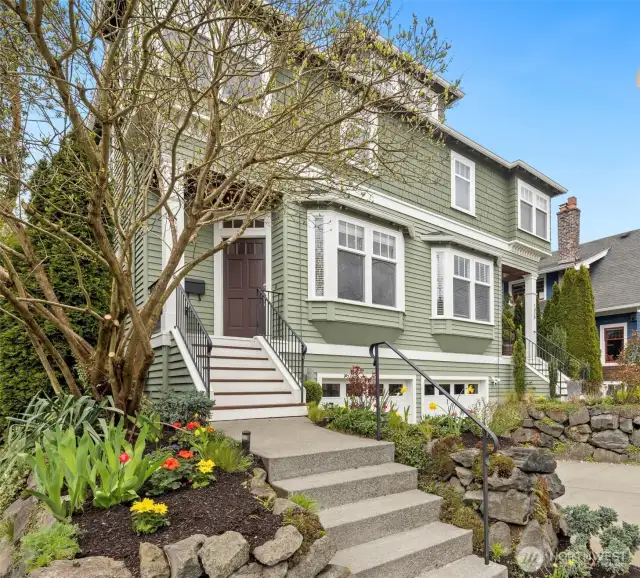 Welcome to 1423 Orange Place North—classic charm and modern comfort wrapped into one picture-perfect Queen Anne townhome.