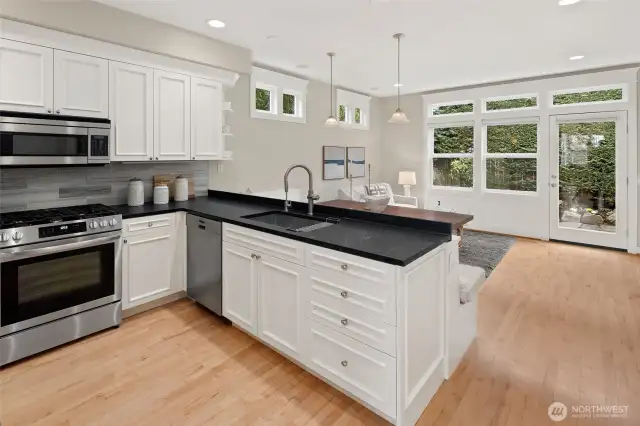 Remodeled in 2024, with stylish yet timeless white cabinetry, this kitchen makes cooking a joy—whether you're whipping up a weeknight dinner or hosting weekend brunch.
