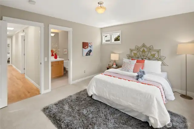 Whether it's for guests, kids, or a home office, this secondary bedroom with its own bath and lovely natural light offers flexible functionality.
