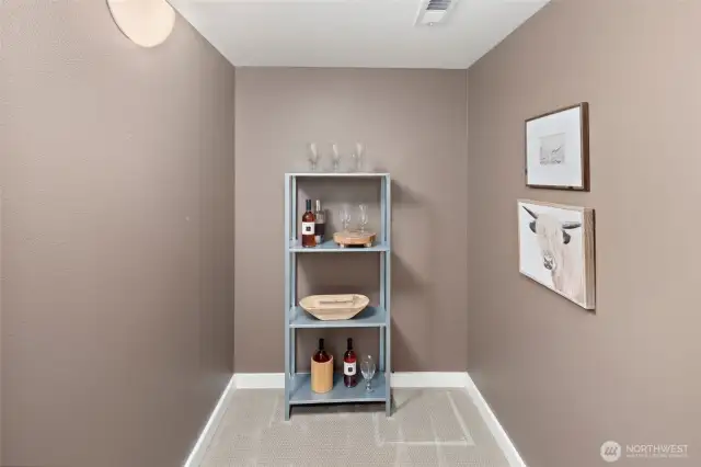 Also on the lower level is this flexible space - making a great wine storage area or petite office with just enough space to personalize.