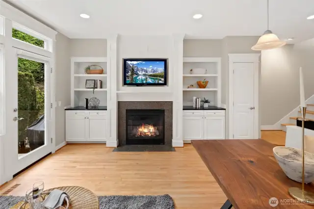 Game days and movie nights just got better! Cozy up by the fireplace in this warm and welcoming family room.