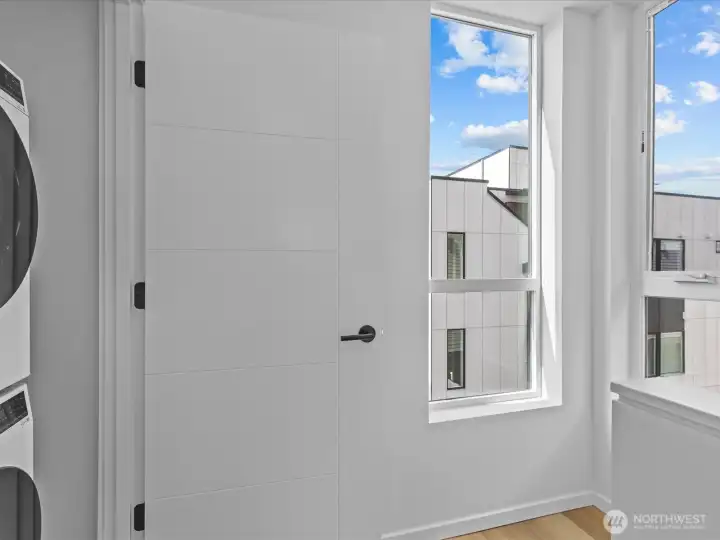 Upper landing with w/d included with more windows and natural light flooding in!