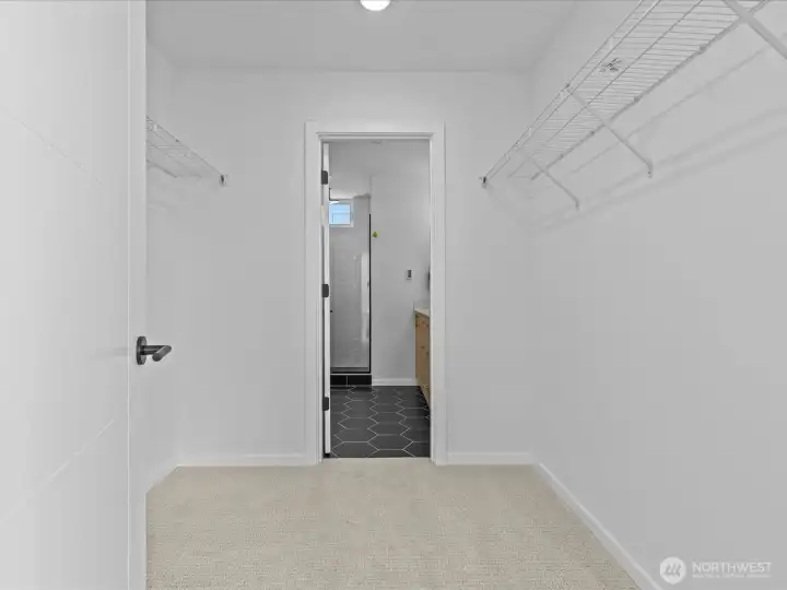 Sprawling walk-in closet leads to your private bathroom!