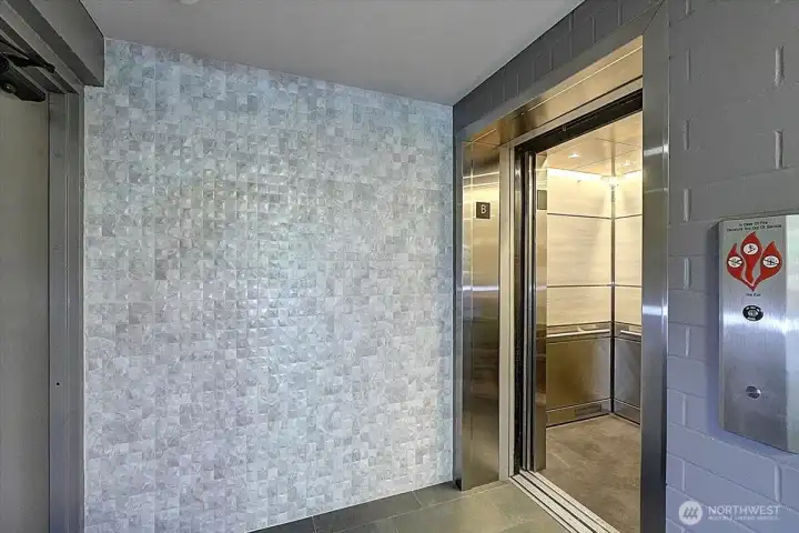 Owner Elevator Entrance to 1st Fl. and Unit