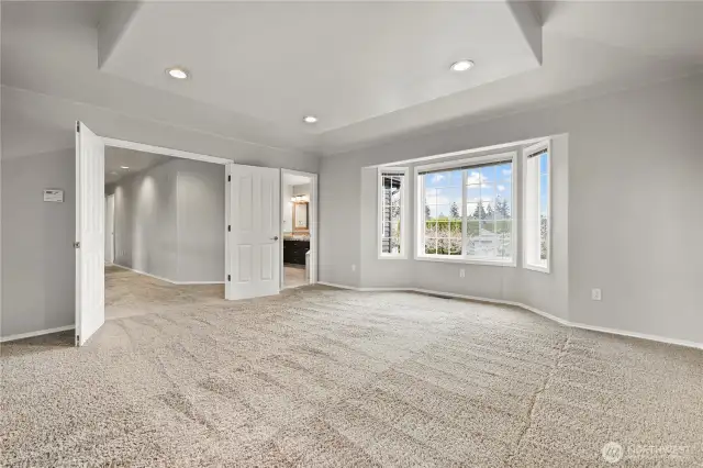 Oversized primary bedroom with bath
