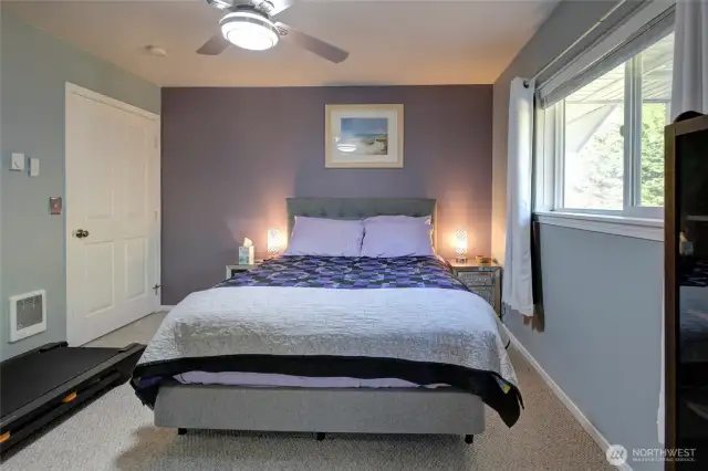 Primary with a walk in closet and a 1/2 bath.