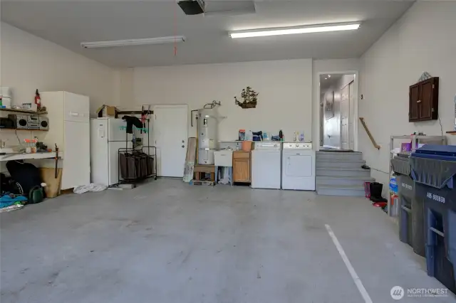 2 car attached garage with the washer and dryer