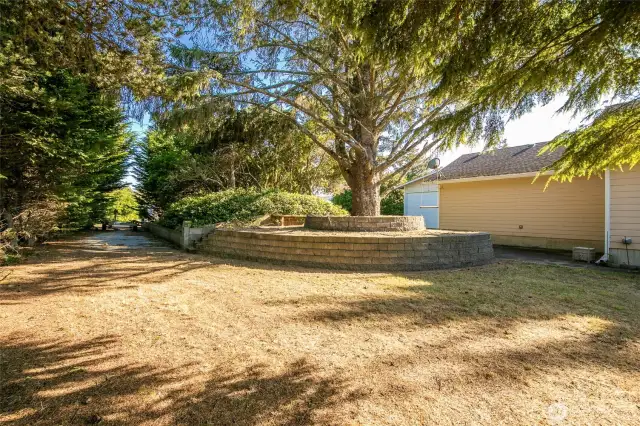 Extra lot with a gate at the street. Good spot for your boat trailer.