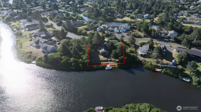 Drone shot of property plus the boat dock