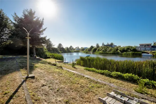 Looking west from your back yard. Wonderful water to kayak, paddle board, pontoon boat and much more.