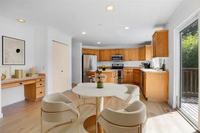 Virtually staged. Study and breakfast nook with back yard and deck access.