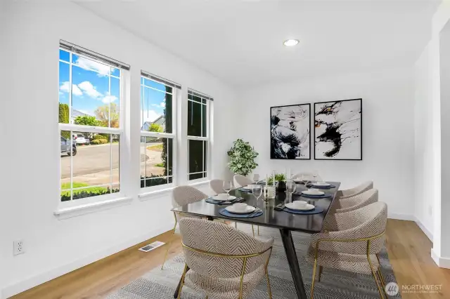 Virtually staged. Dining room.