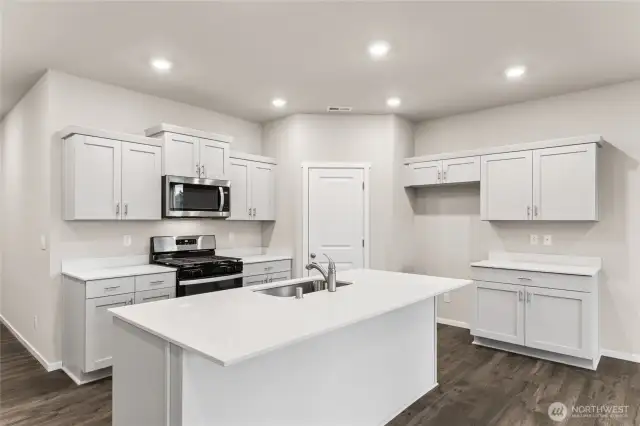 Pull up some counter height stools around the kitchen island.