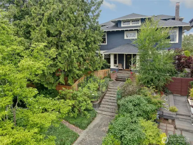 Just a 10 minute stroll from Seward Park sits this classic home built for a retired NY Farmer named George Peckham and his Canadian wife Anne.