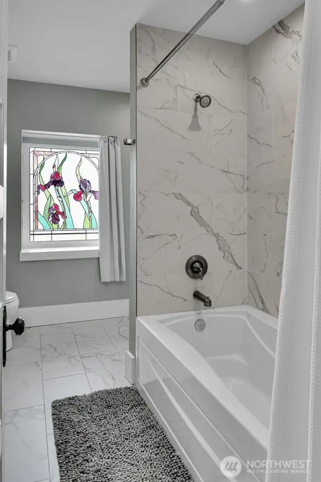 Looking the opposite direction to show the wonderful art glass window.