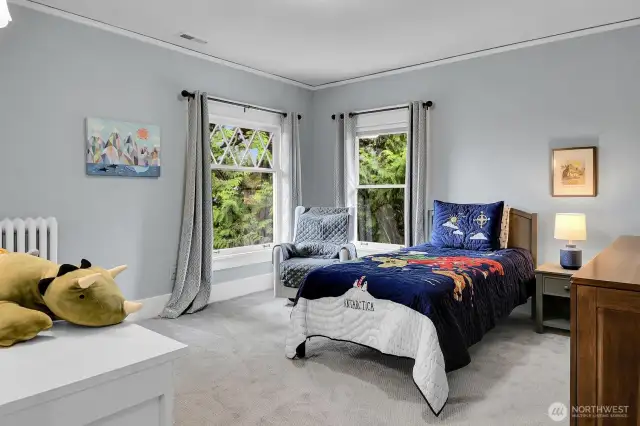 3rd of 4 upper floor bedrooms. Walk in closet out of frame to the left here.